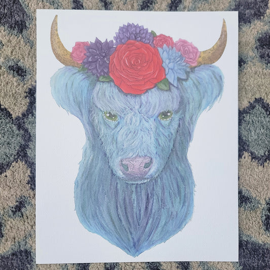 Watercolor highland cow with blue fur wearing a floral crown of red, purple, and pink flowers.